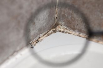 Migroa Silicone Caulk Tape. The two-dollar fix that stops bathroom mold cold