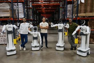 Avatar Robotics. Humanoid workers step into the warehouse floor