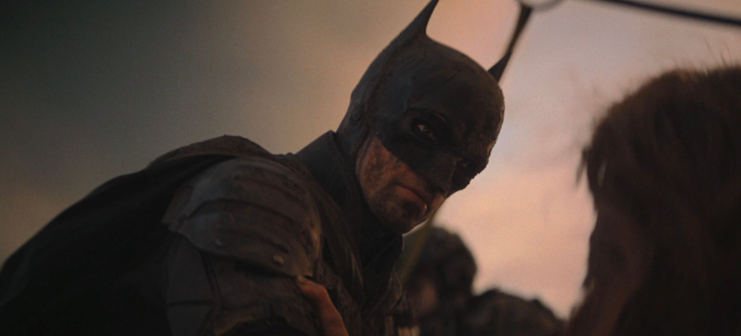 The Batman Part II. Protest signs point to the Court of Owls and Anarky