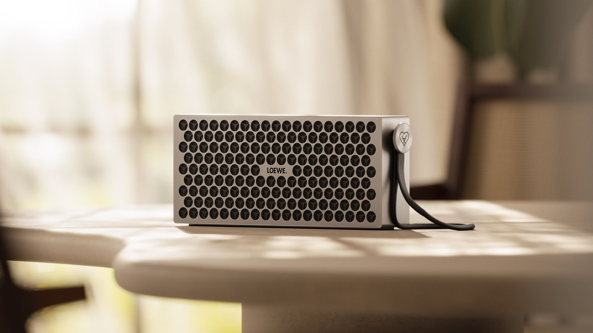 Loewe Neo. A 50-watt aluminium Bluetooth speaker that lights up the party