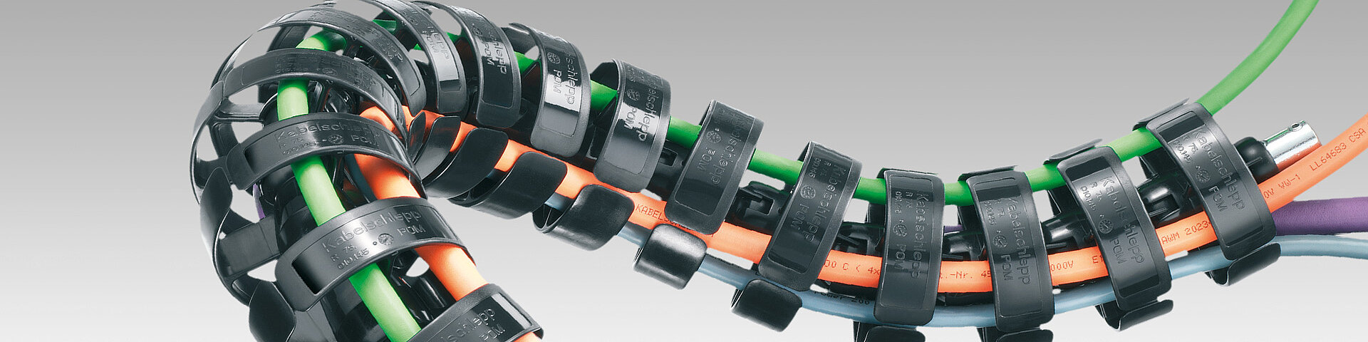 Tsubaki KabelSchlepp Robotrax. A 3D lifeline for robot cables at 10 g