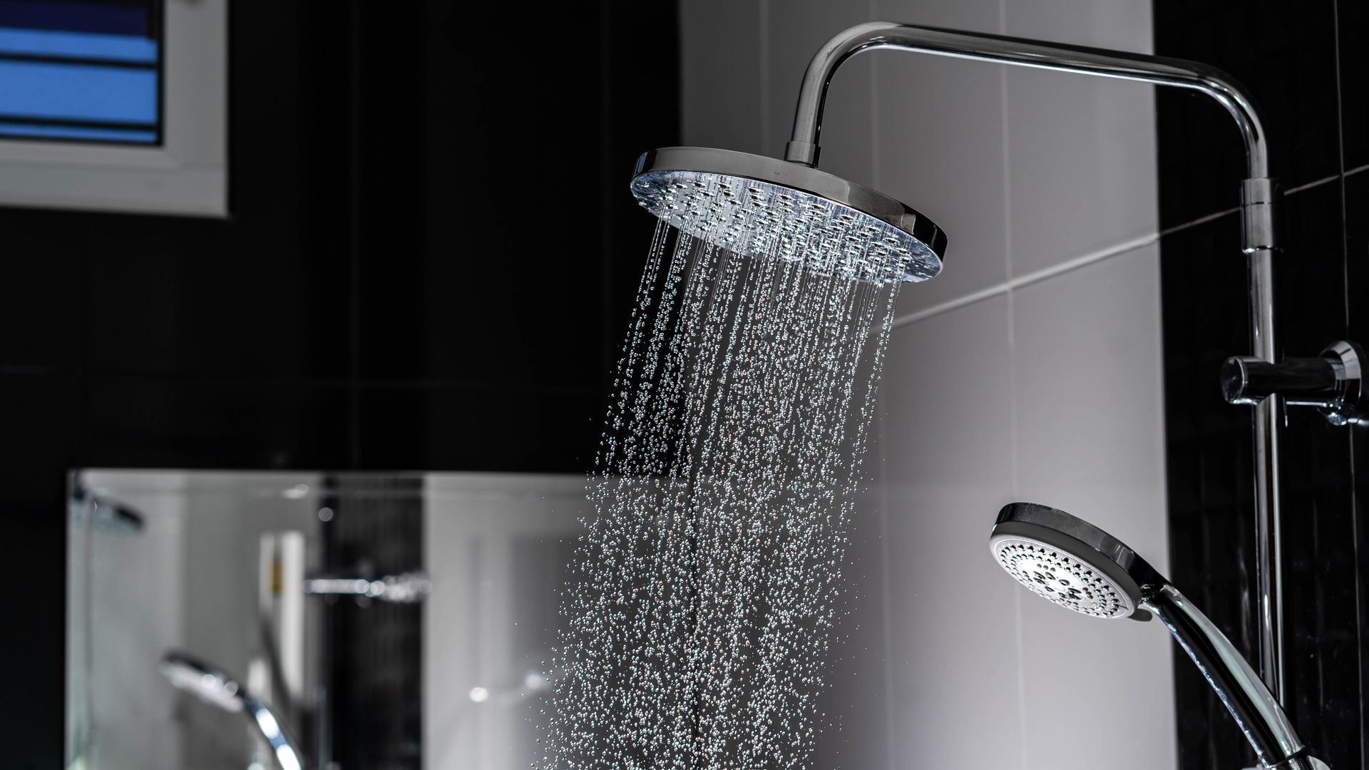 Your Shower Curtain Is a Mold Farm. Why Glass Screens Win the Bathroom