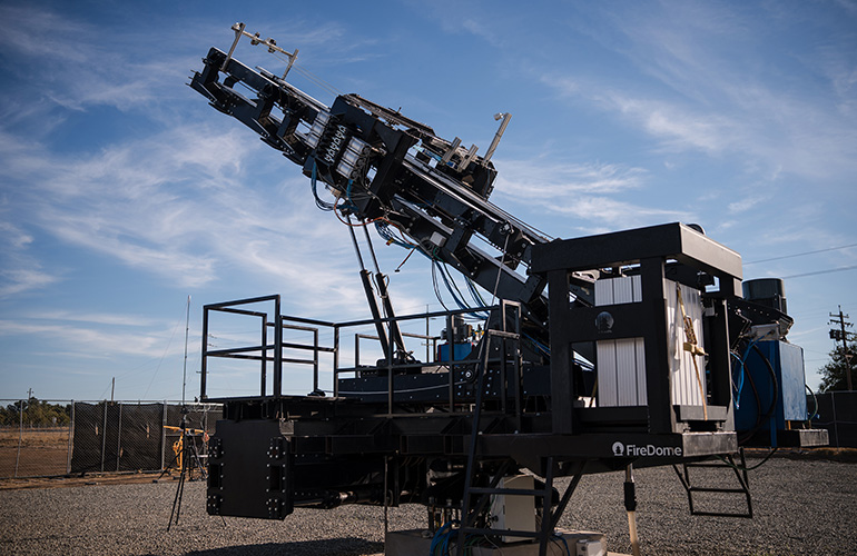 FireDome Wildfire Defense System. A robotic launcher that fires retardant first